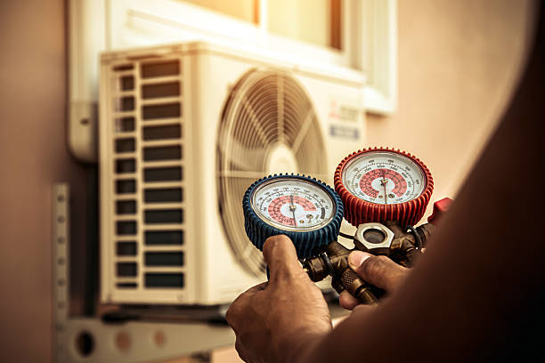 Professional Air Conditioning Service technician working in Saint Johns, FL